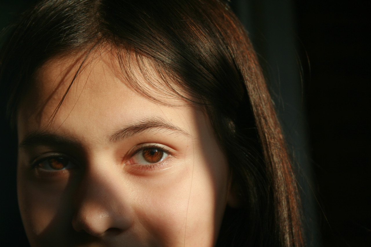 Photograph of a set of brown eyes.