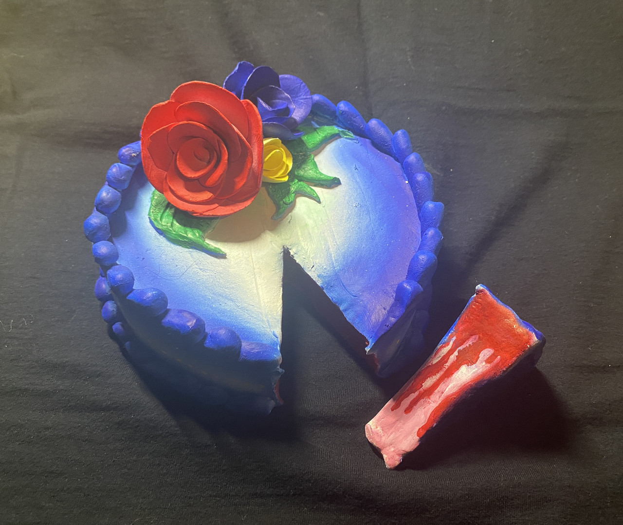 Realistic sculpture of cake