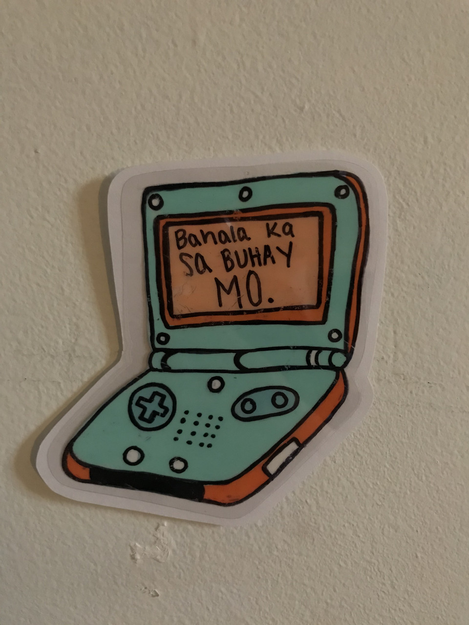 Illustration of green handheld console