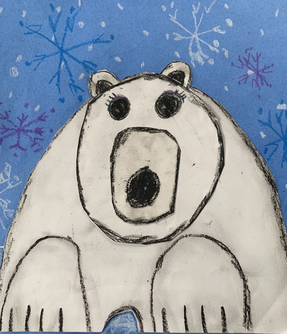 A white polar bear against a blue background with snowflakes