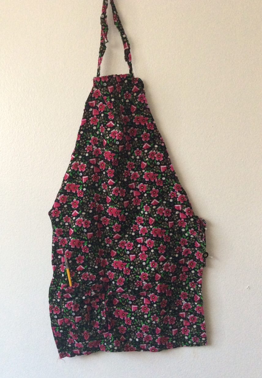 Black and red floral apron