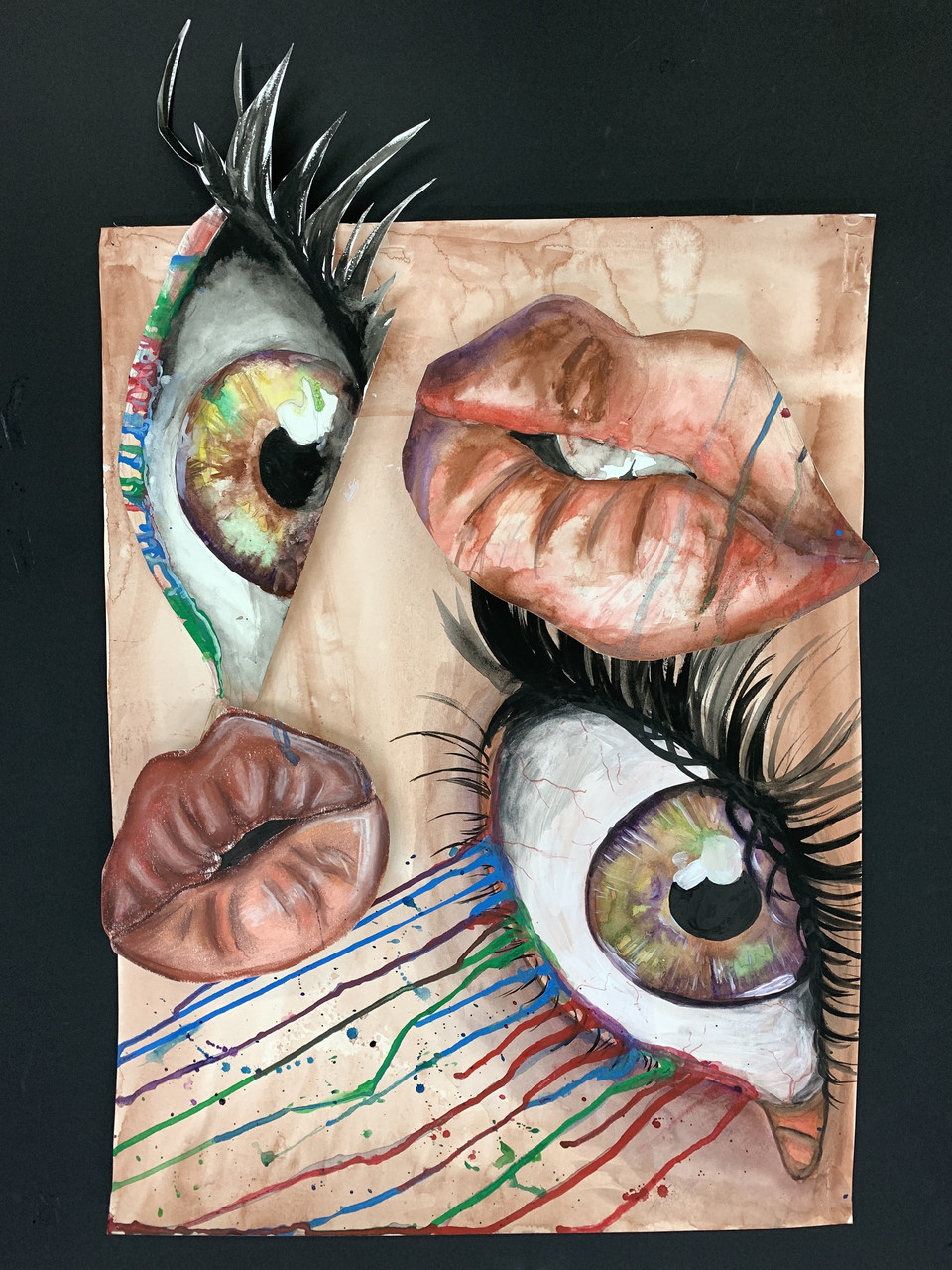 A surreal artwork with two large eyes that have colors dripping from them and two large mouths.