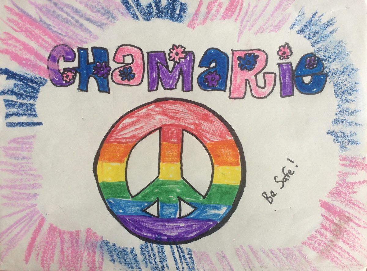 A colorful design with a rainbow peace sign
