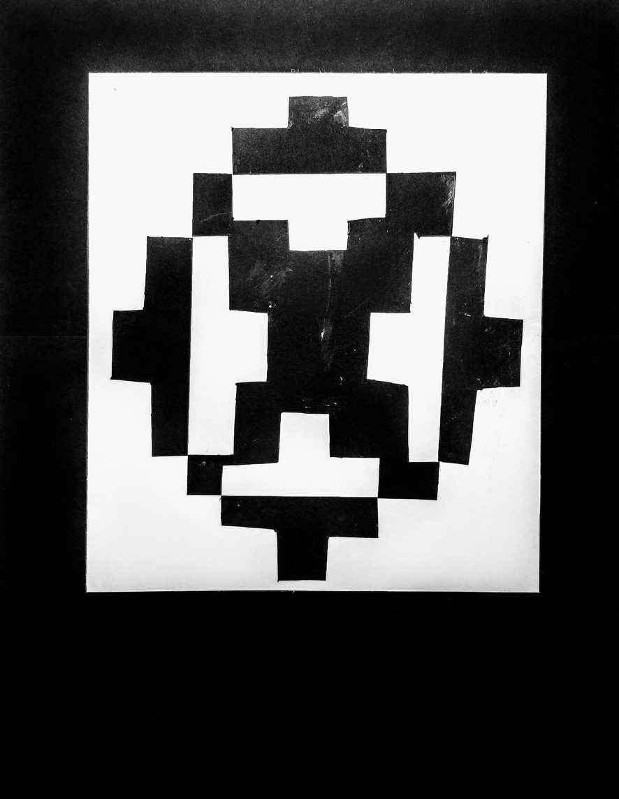Geometric black and white shapes as mirror images