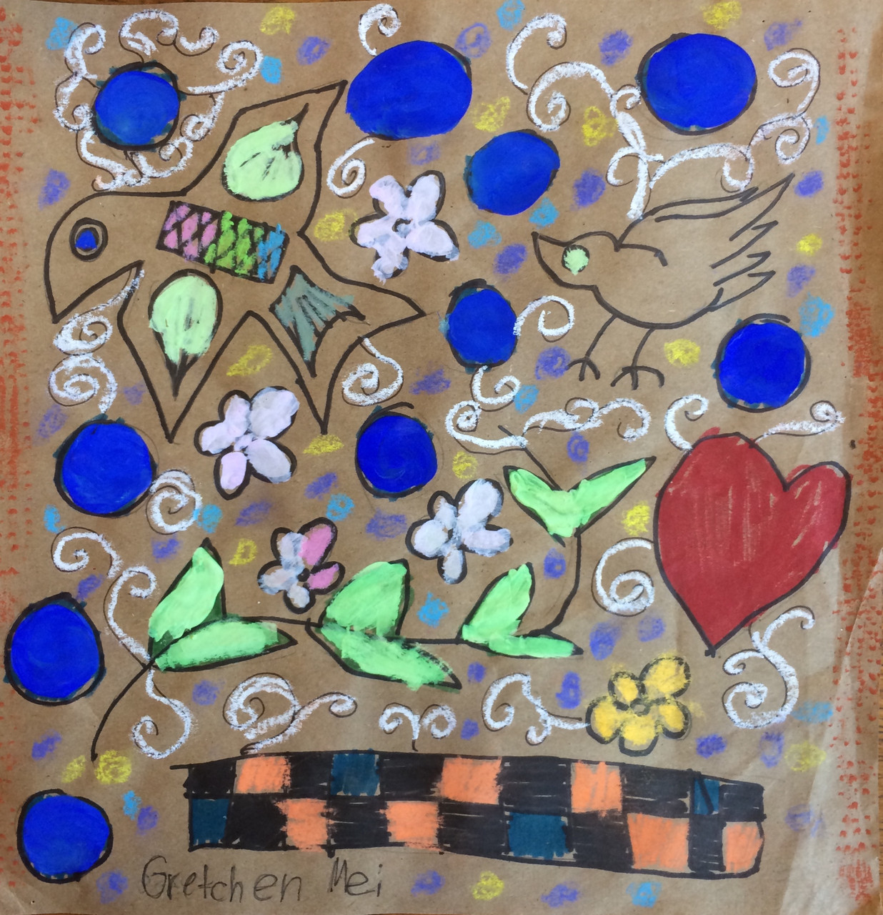A colorful painting of flower designs on brown paper