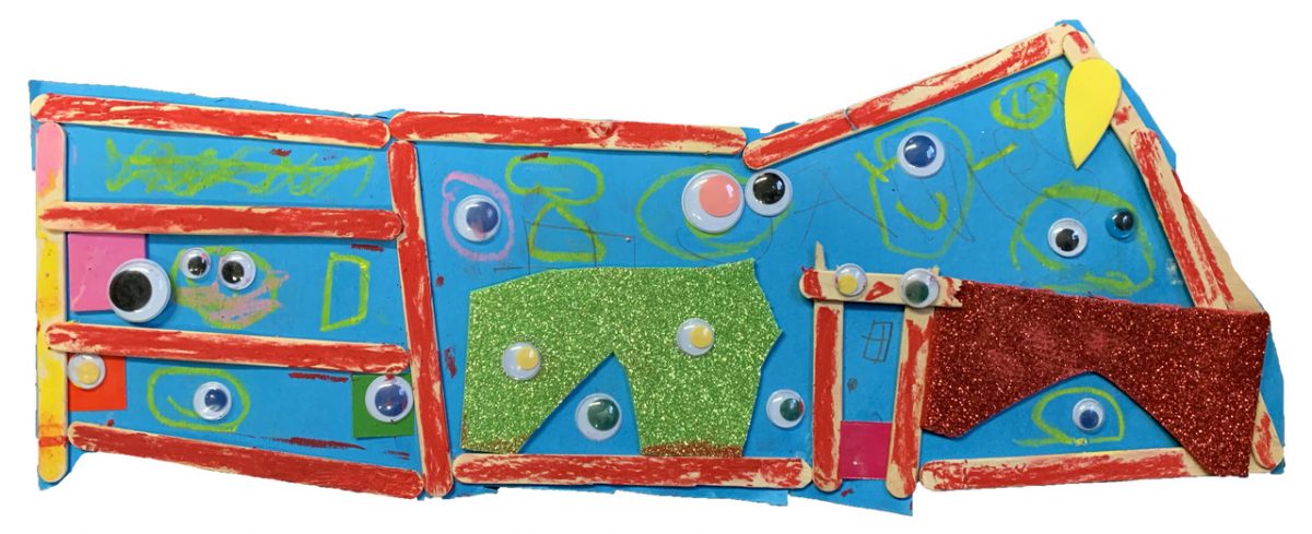 Red painted popsicle sticks and green sparkle foam on a blue background with googly eyes.