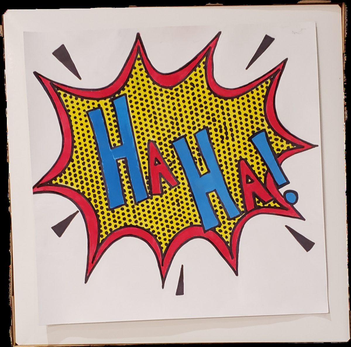 "Ha Ha!" in alternating red and blue letters in a yellow burst, comic book style.