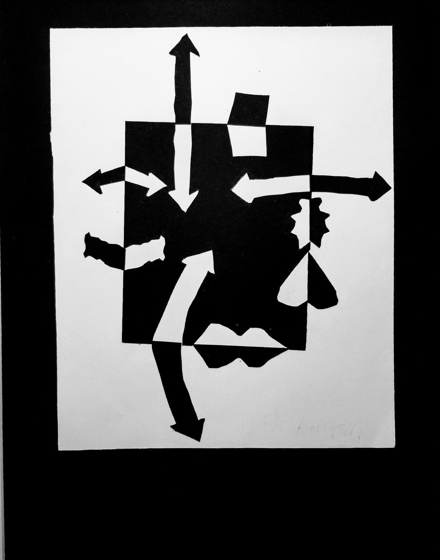 Abstract shapes of cut paper, black and white are mirror image