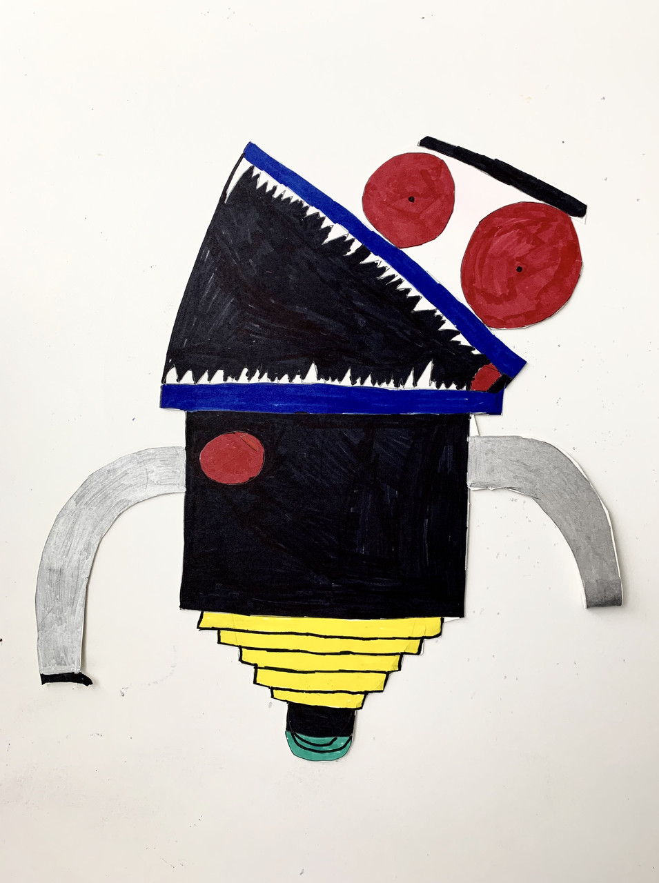 Robot with black body and blue wheel, large mouth with pointy teeth and red eyes.