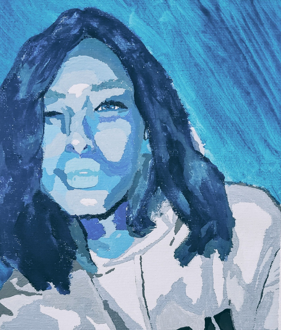 Painting of a girl's face in tones of blue.