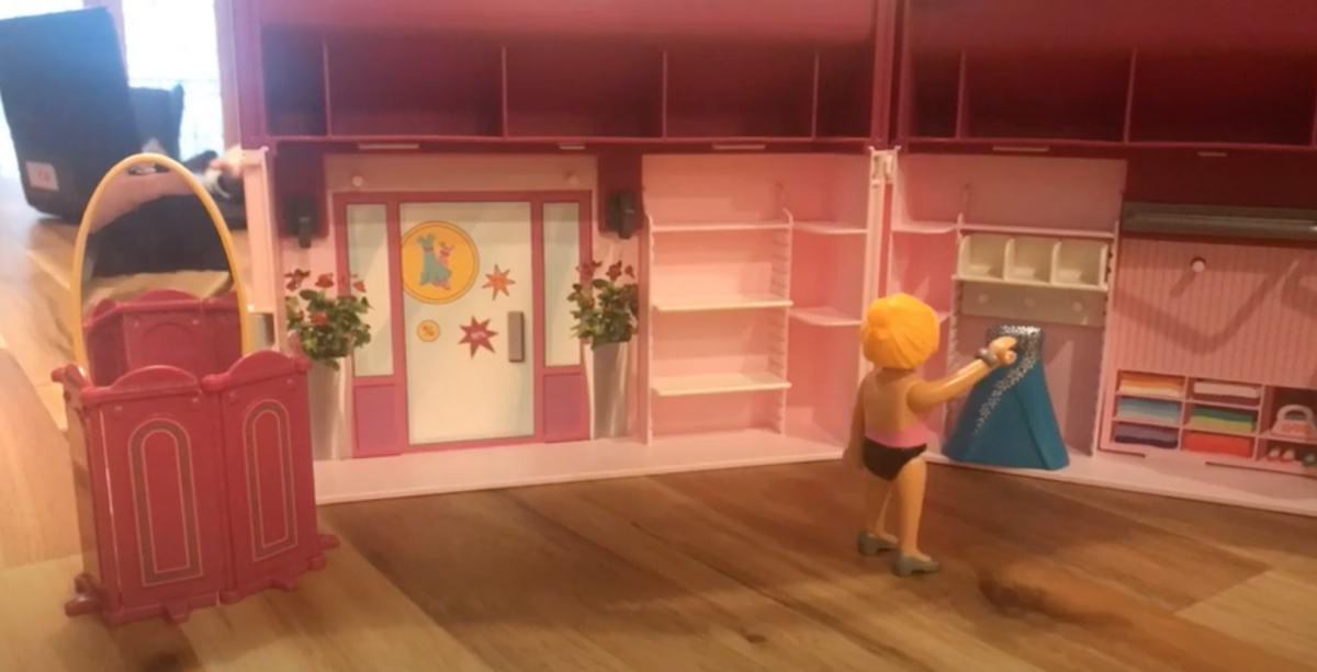 Doll in dollhouse