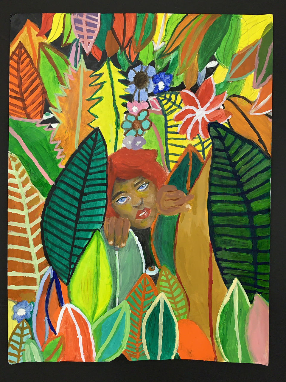 A colorful painting of jungle plants and leaves with a figure peaking out of the plants.