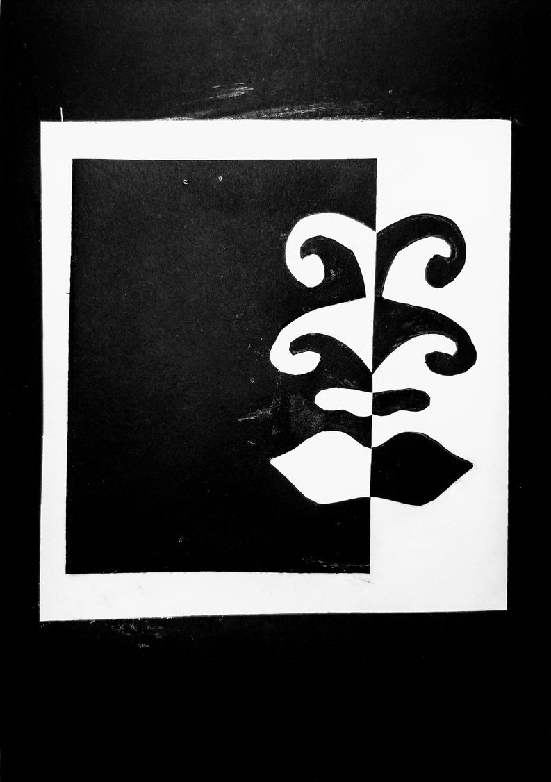 Abstract shapes, black on one side, mirror reflection white