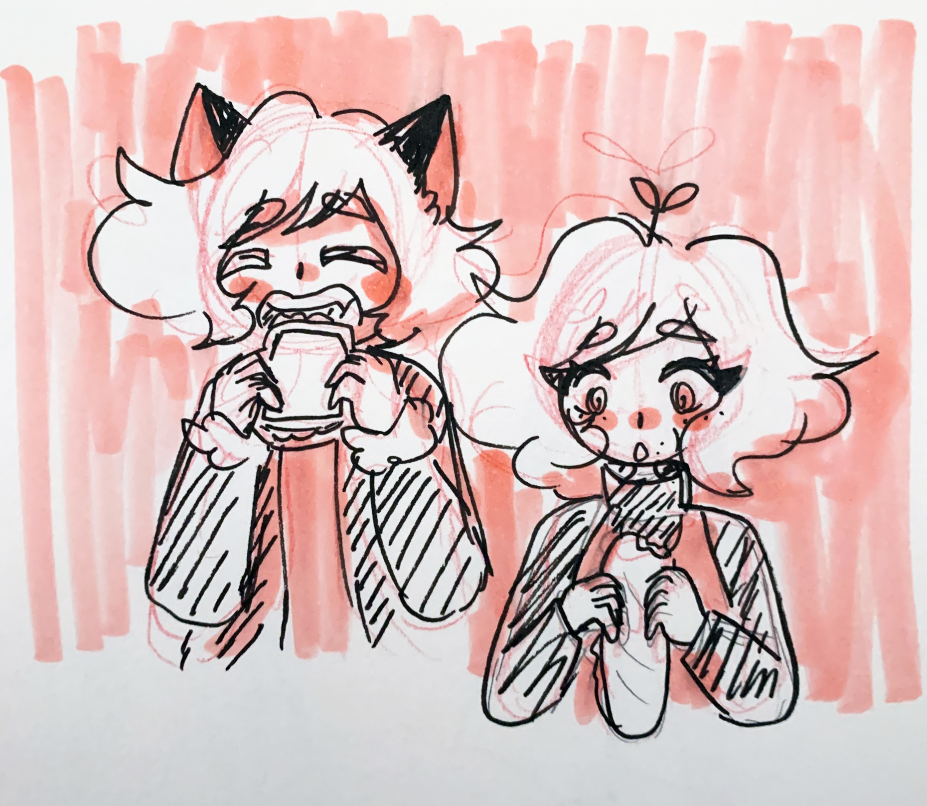 two people eating sandwiches