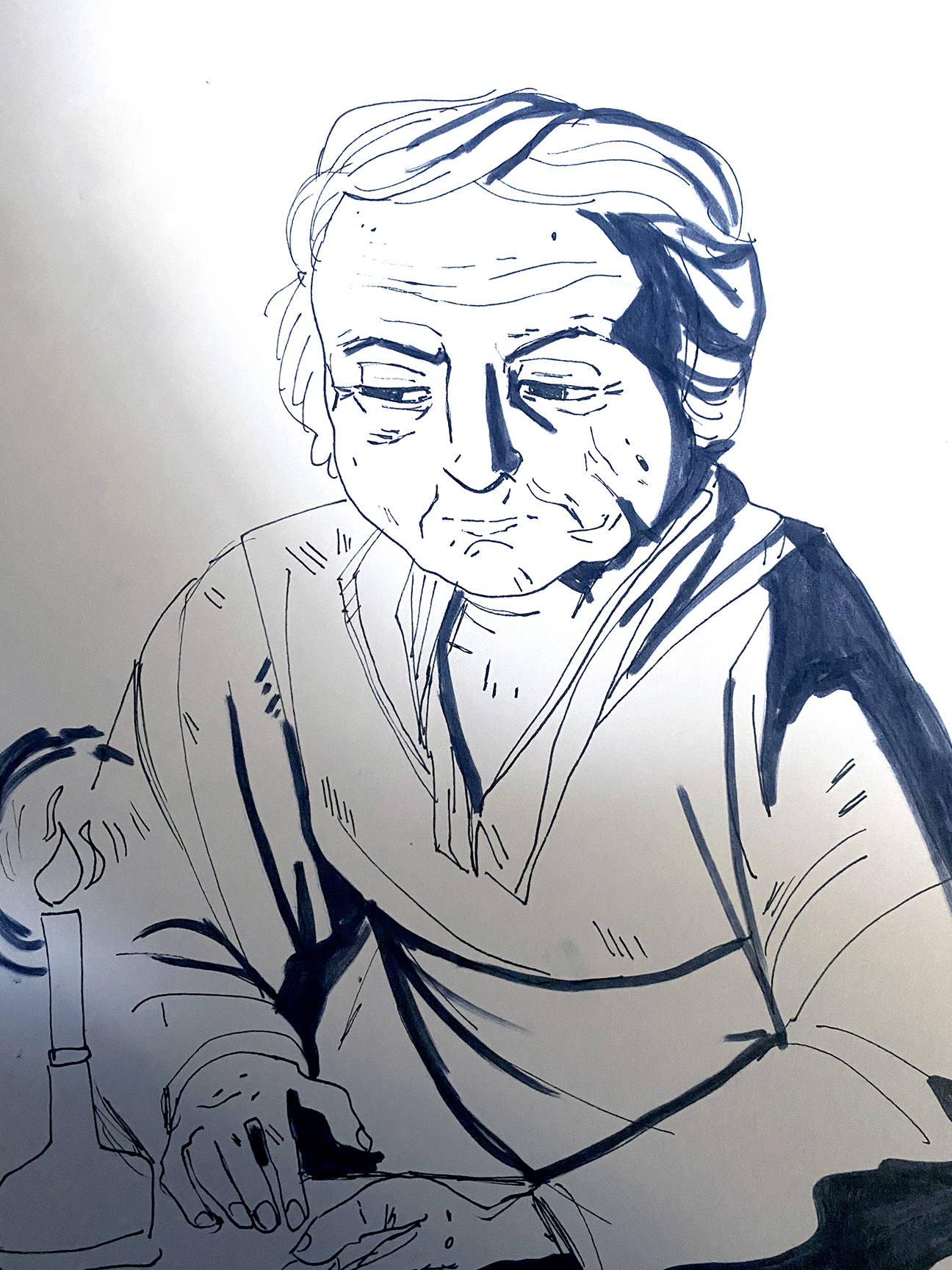 person looking at candle