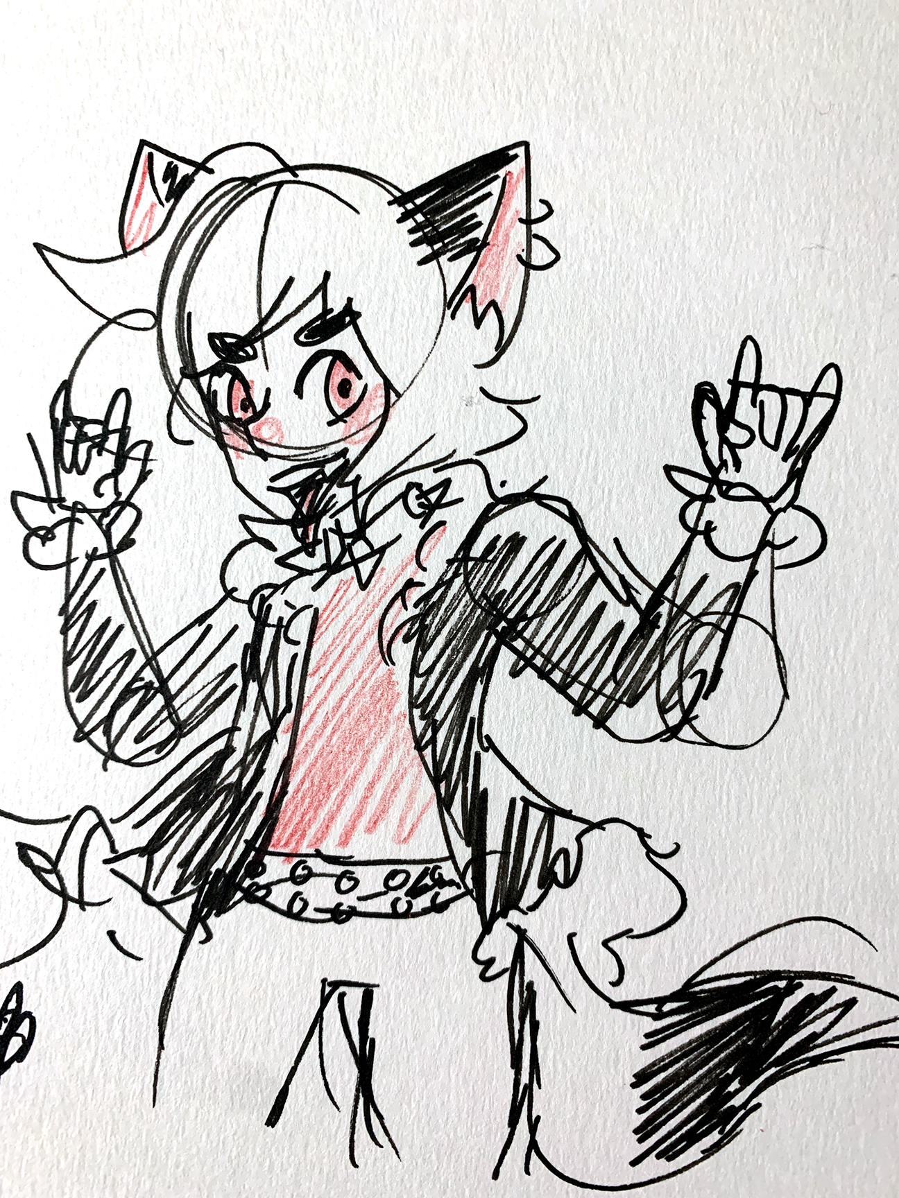 fox-like person making "rock on" hands