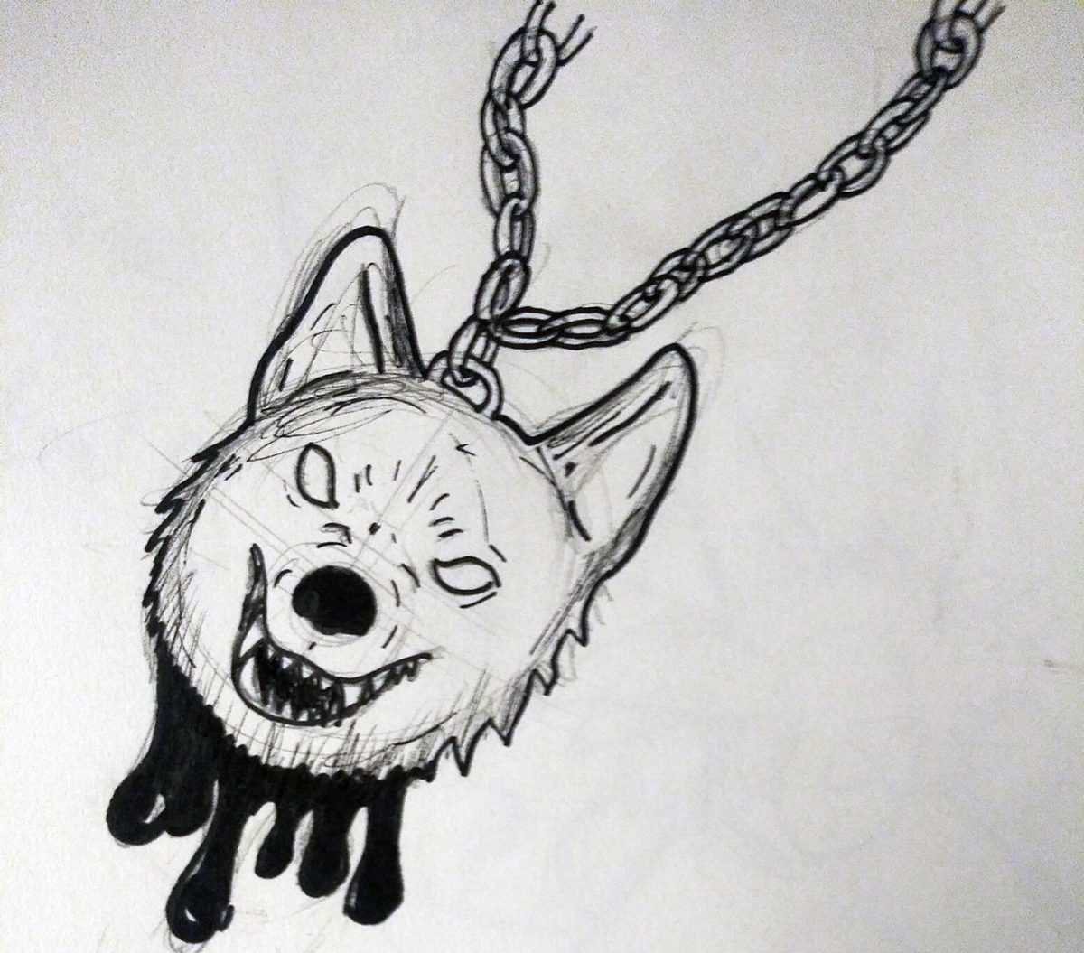 bloody wolf head on a locket