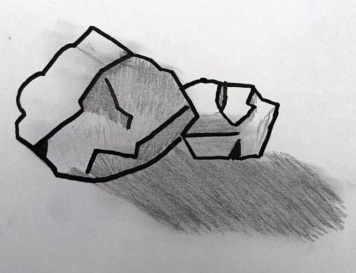 two rocks with shadows