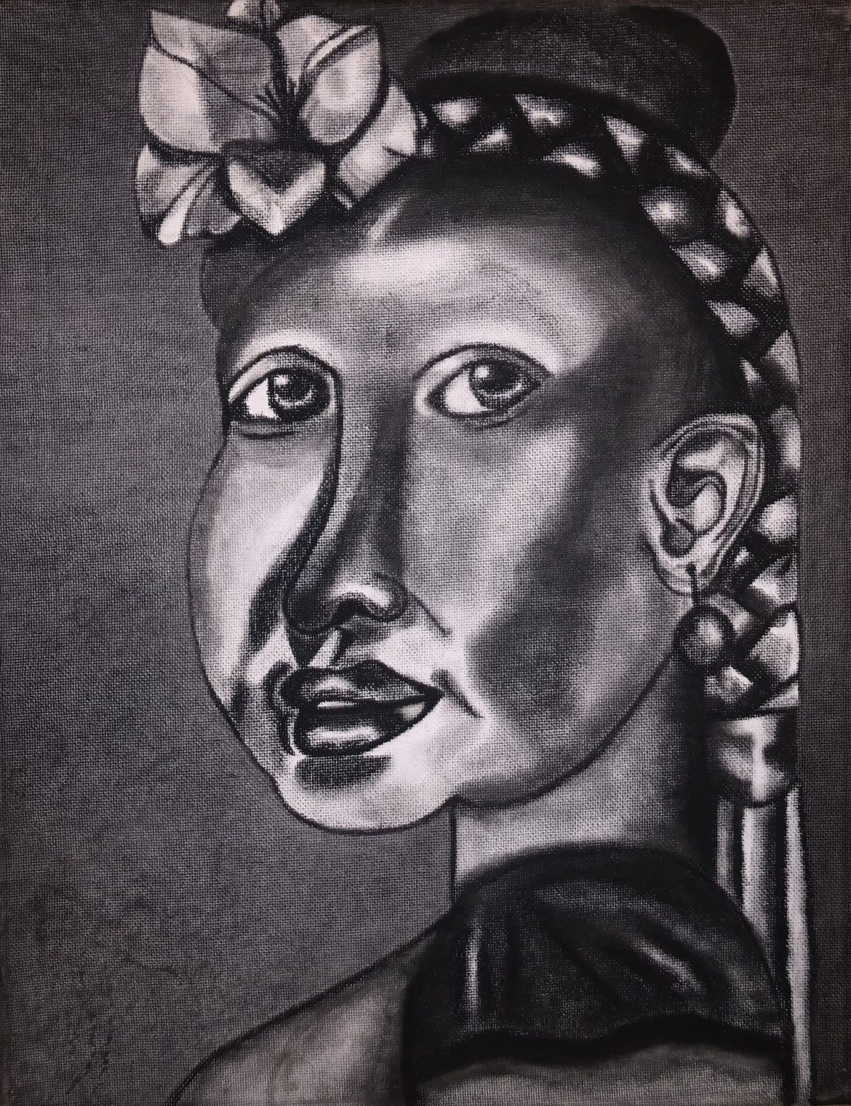 Charcoal drawing of person with bun and flowered headband.