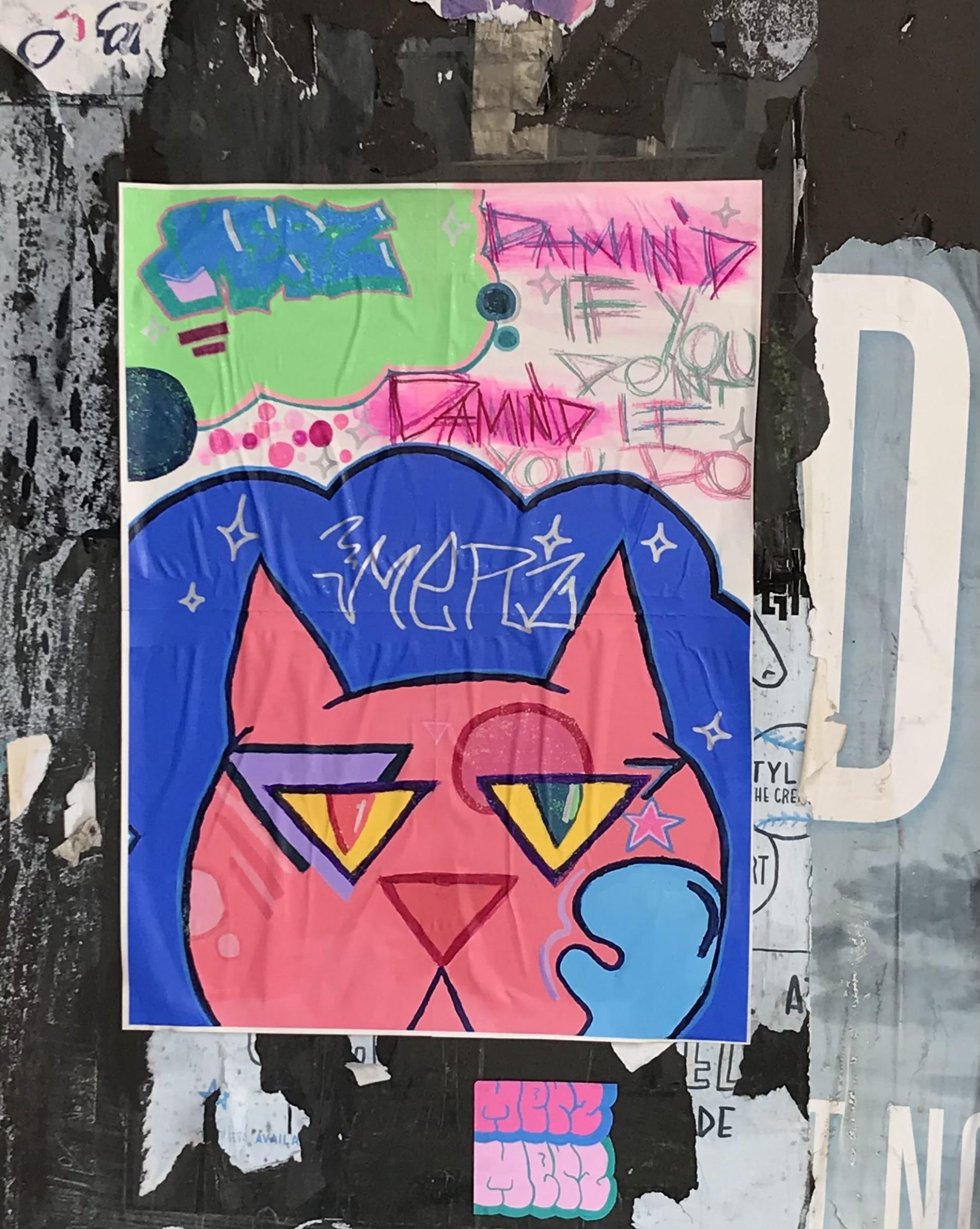 graphic poster of pink cartoon cat.