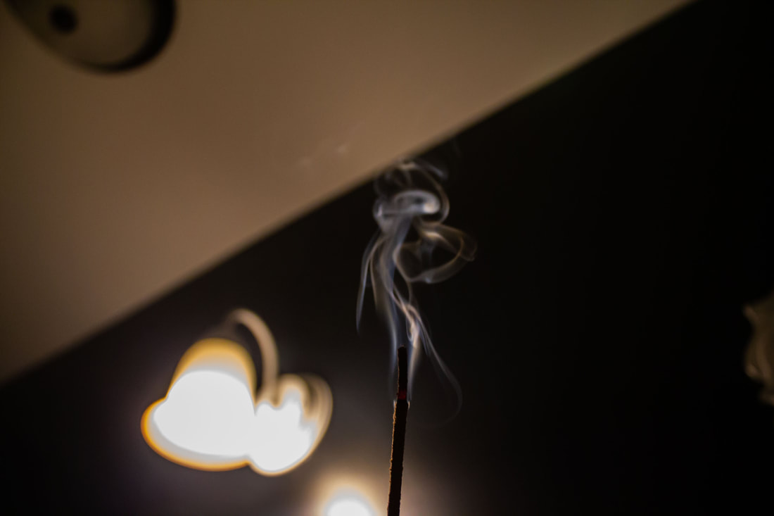 Photograph of sconce that is out of focus.