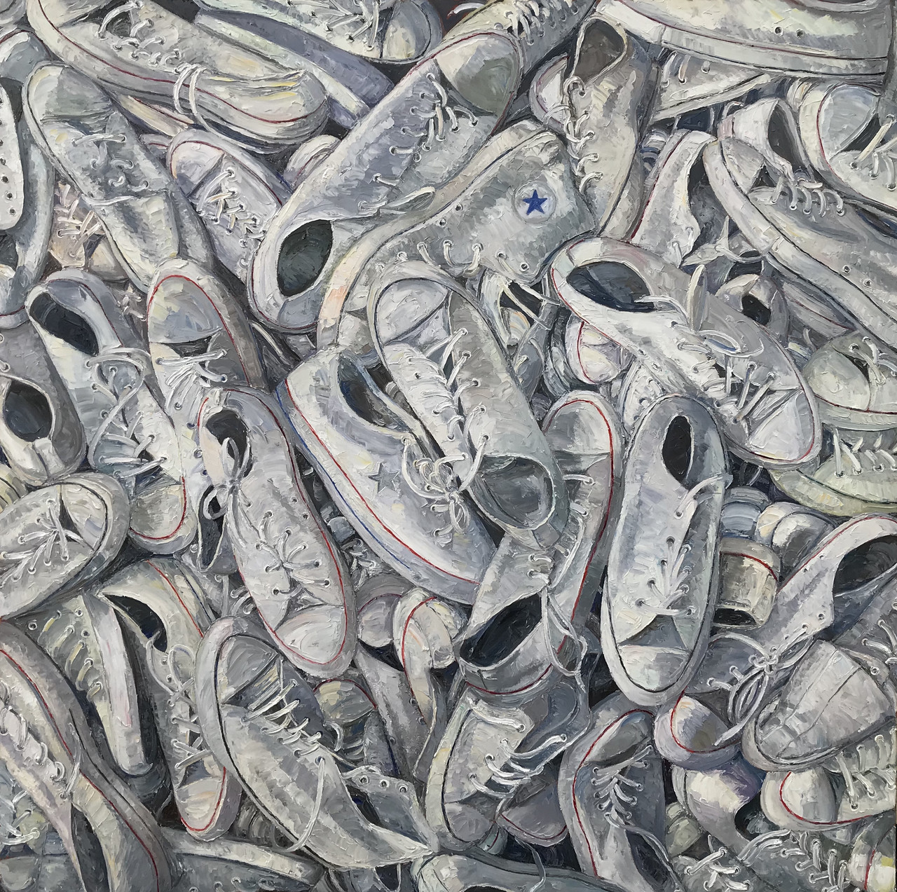 A pile of white sneakers.