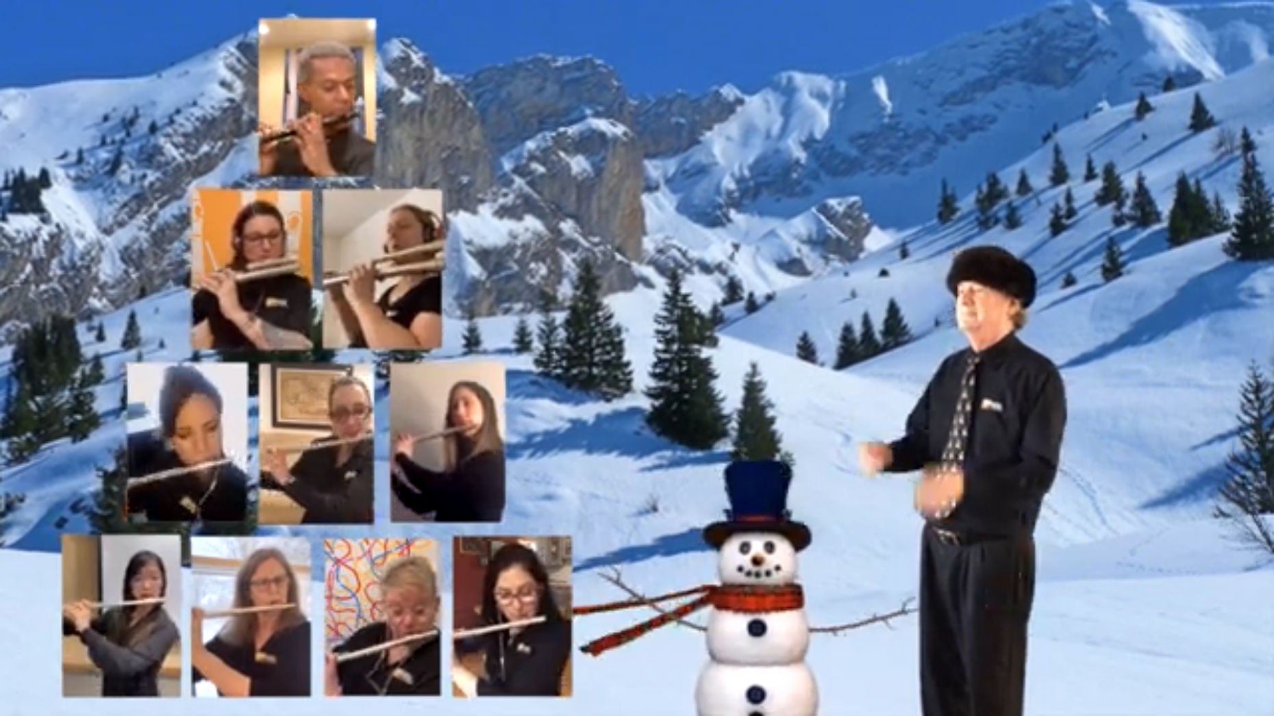 10 flautists superimposed on a digital winter background. There is a cartoon snowman in the foreground. The conductor, dressed in black and wearing a black hat, is on the right.