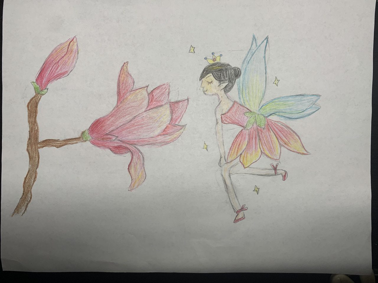 Drawing of fairy in pink dress sniffing pink flower.