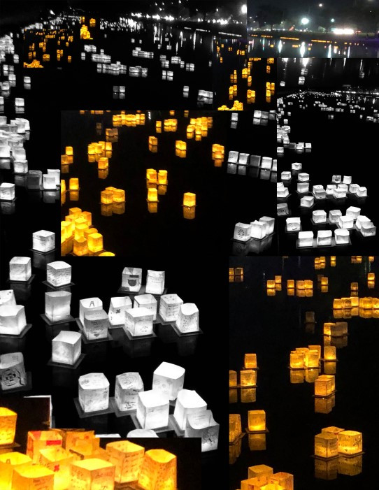 A dark photo of white and orange glowing cubes