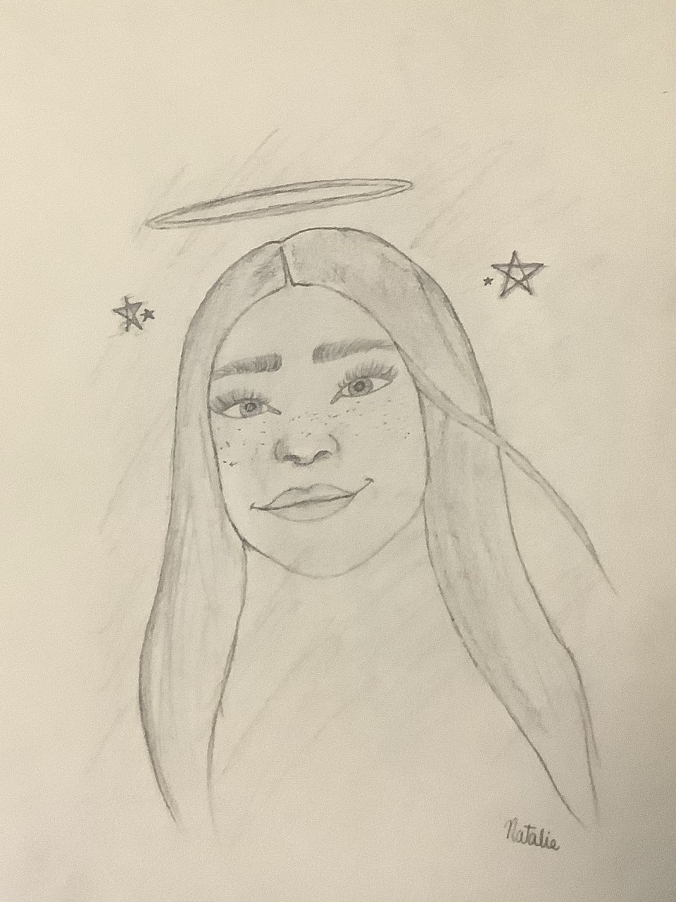 Drawing of a girl with a halo and stars around her head