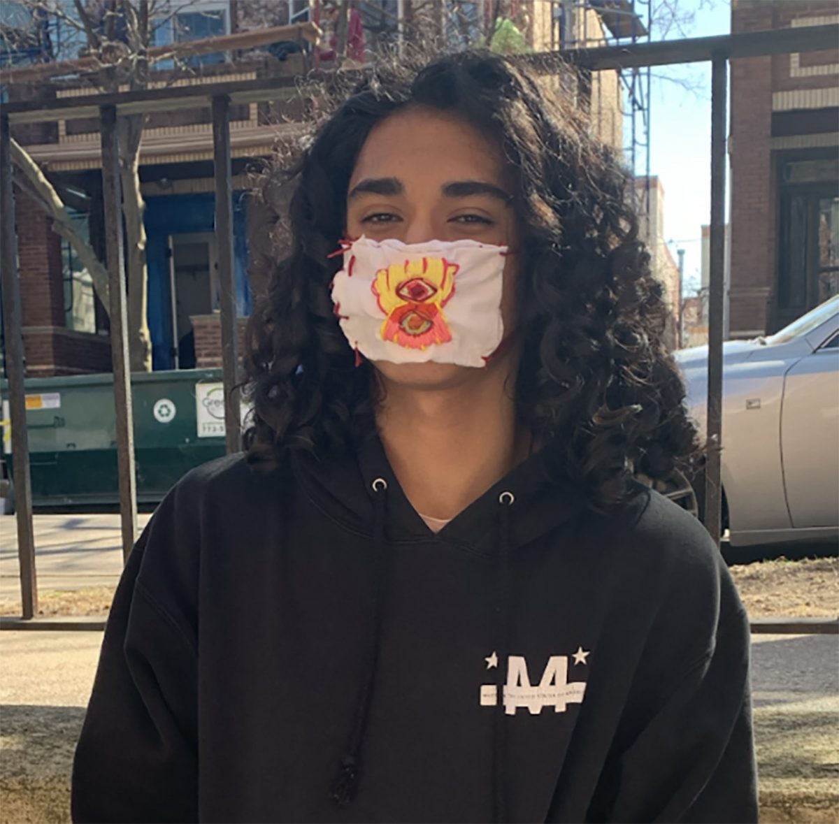 Mask with yellow and orange triangles