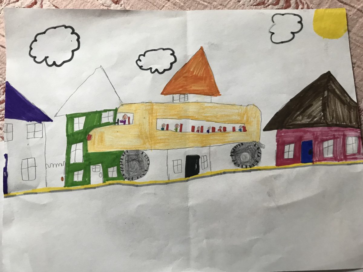 Drawing of a school bus in front of houses