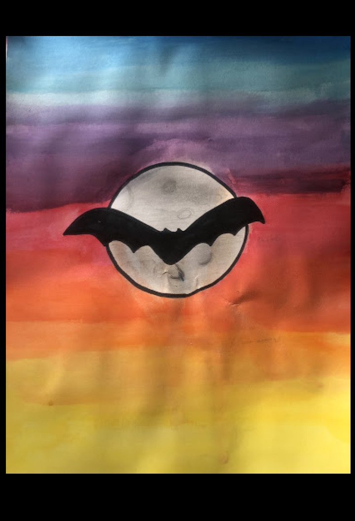 A rainbow background with a small moon and a black bat