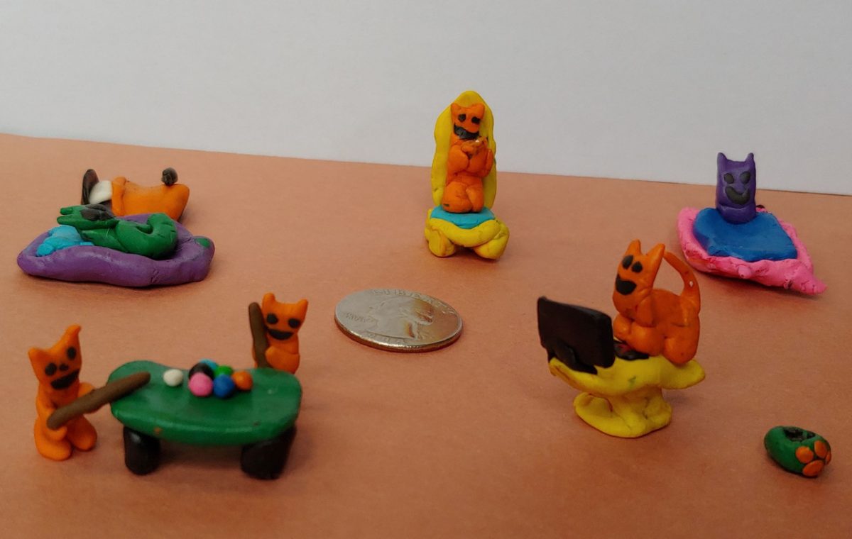 Modeling clay sculptures of cats