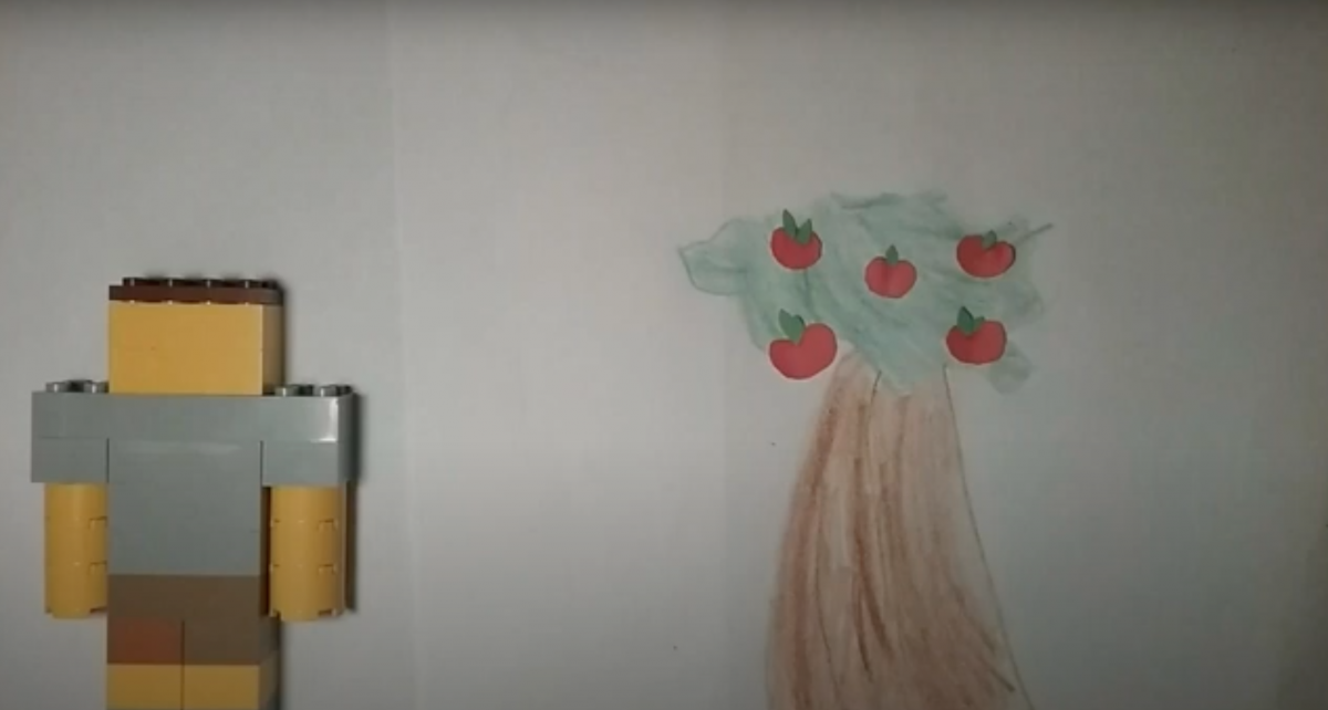 Lego guy with drawn tree.