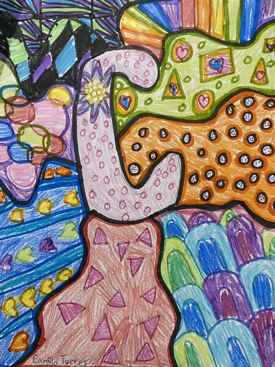 A zentangle drawing of the letter C with different patterns and colors