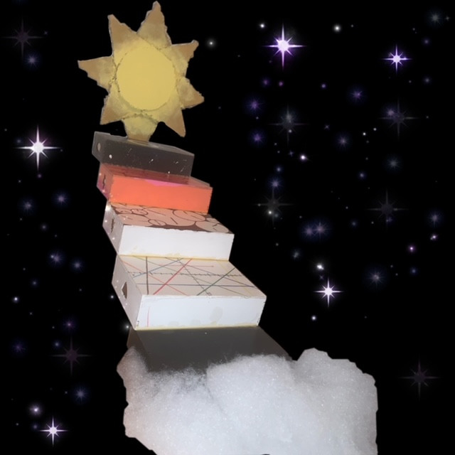 Sculpture of stairway with sun at the top