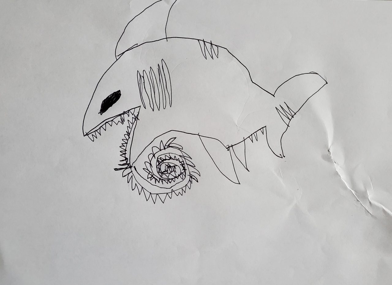 Line drawing of a shark-like creature with a long spiky tongue