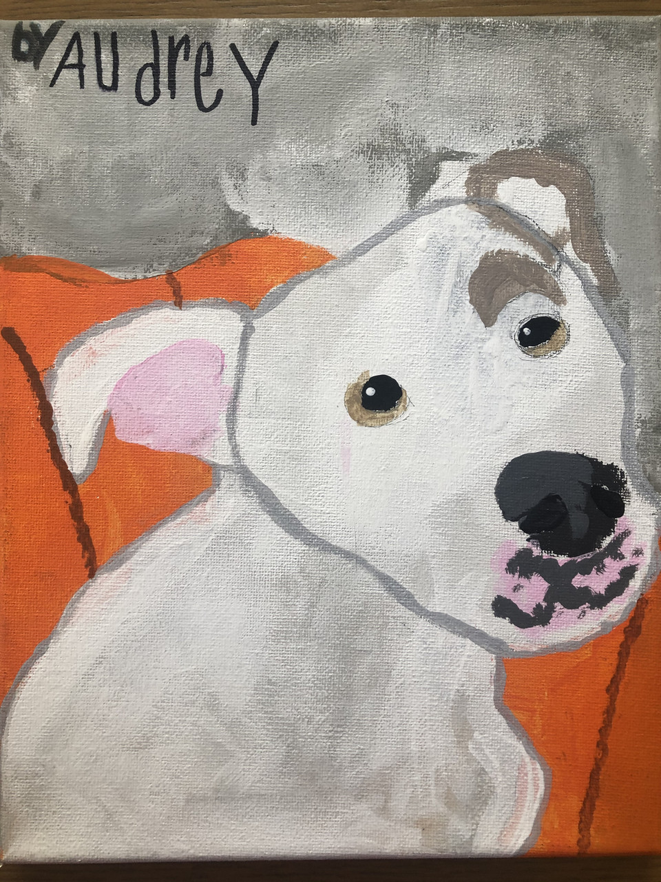 Painting of a white dog on an orange chair.