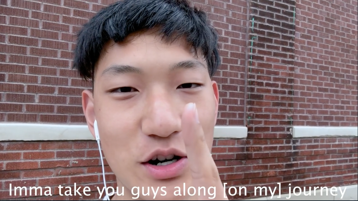 Video of a man pointing with headphones in