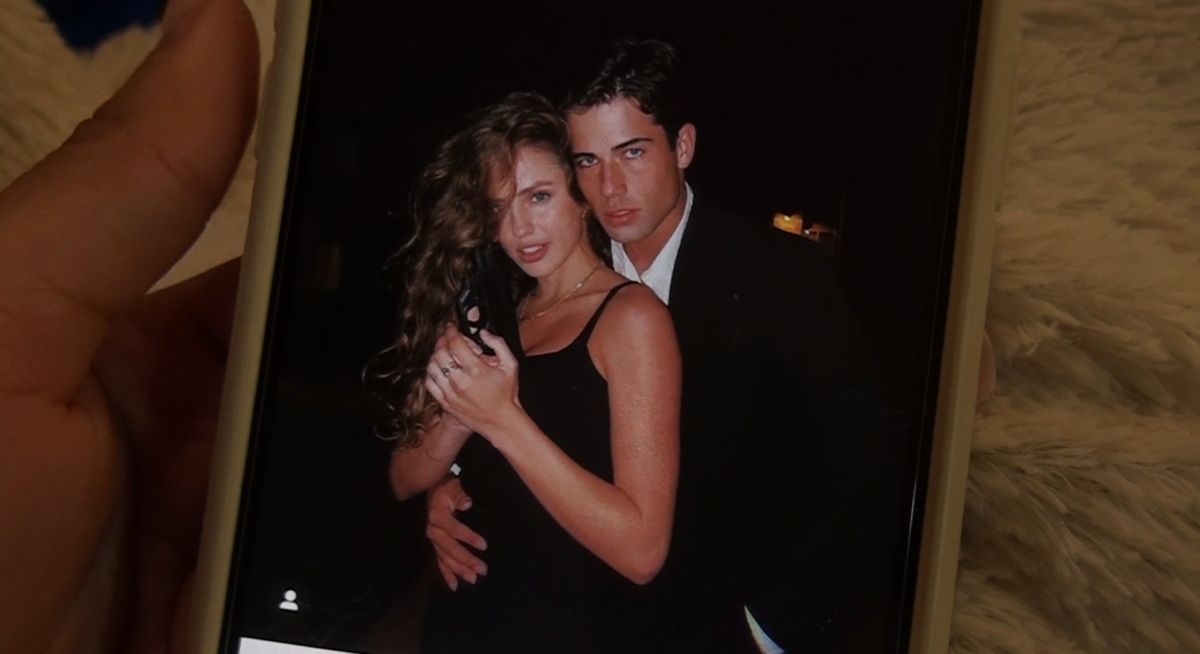 Person looking at social media on their phone