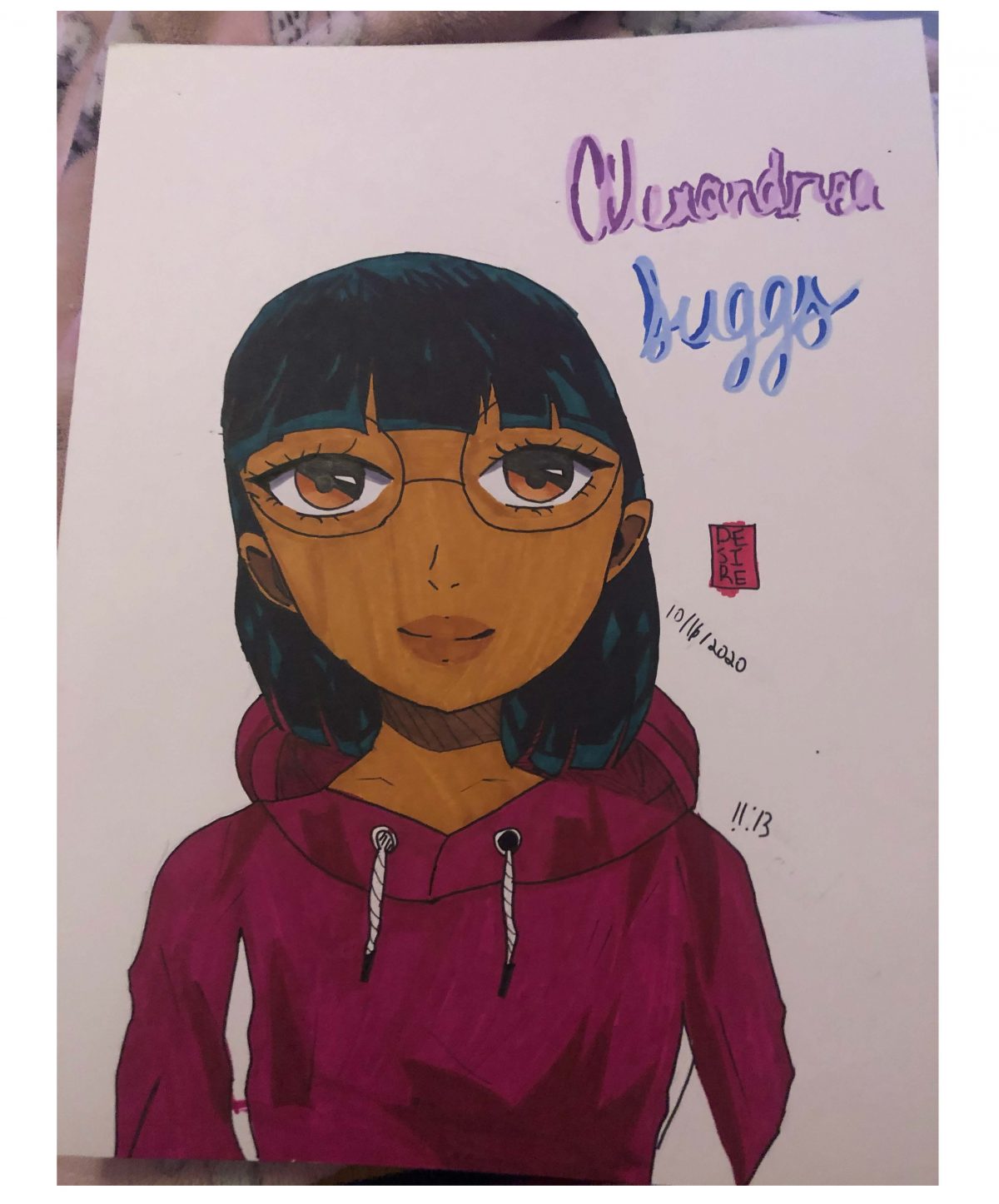 Self portrait of person with dark hair in a purple hoodie