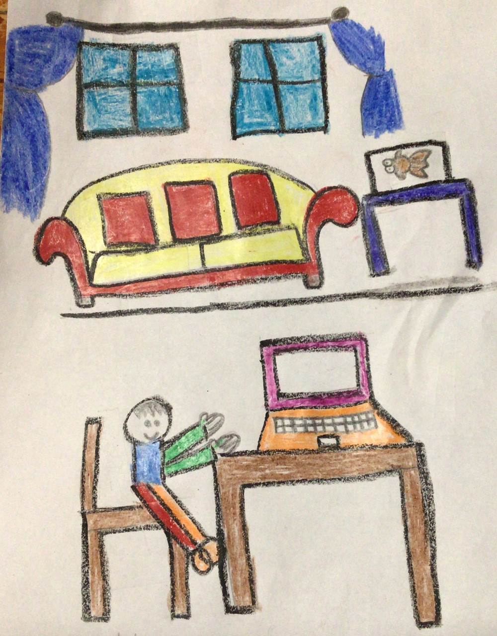 A picture of the inside of someones house and a person sitting at a computer
