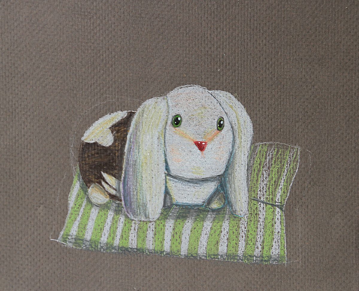 Drawing of a bunny on a blanket