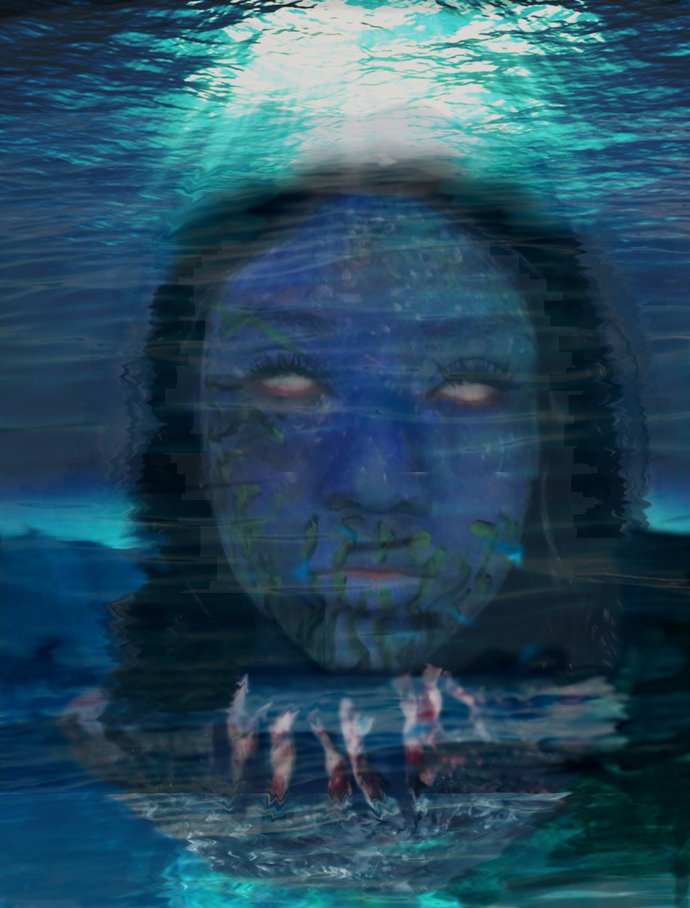 Picture of a girl's face in blue, underwater