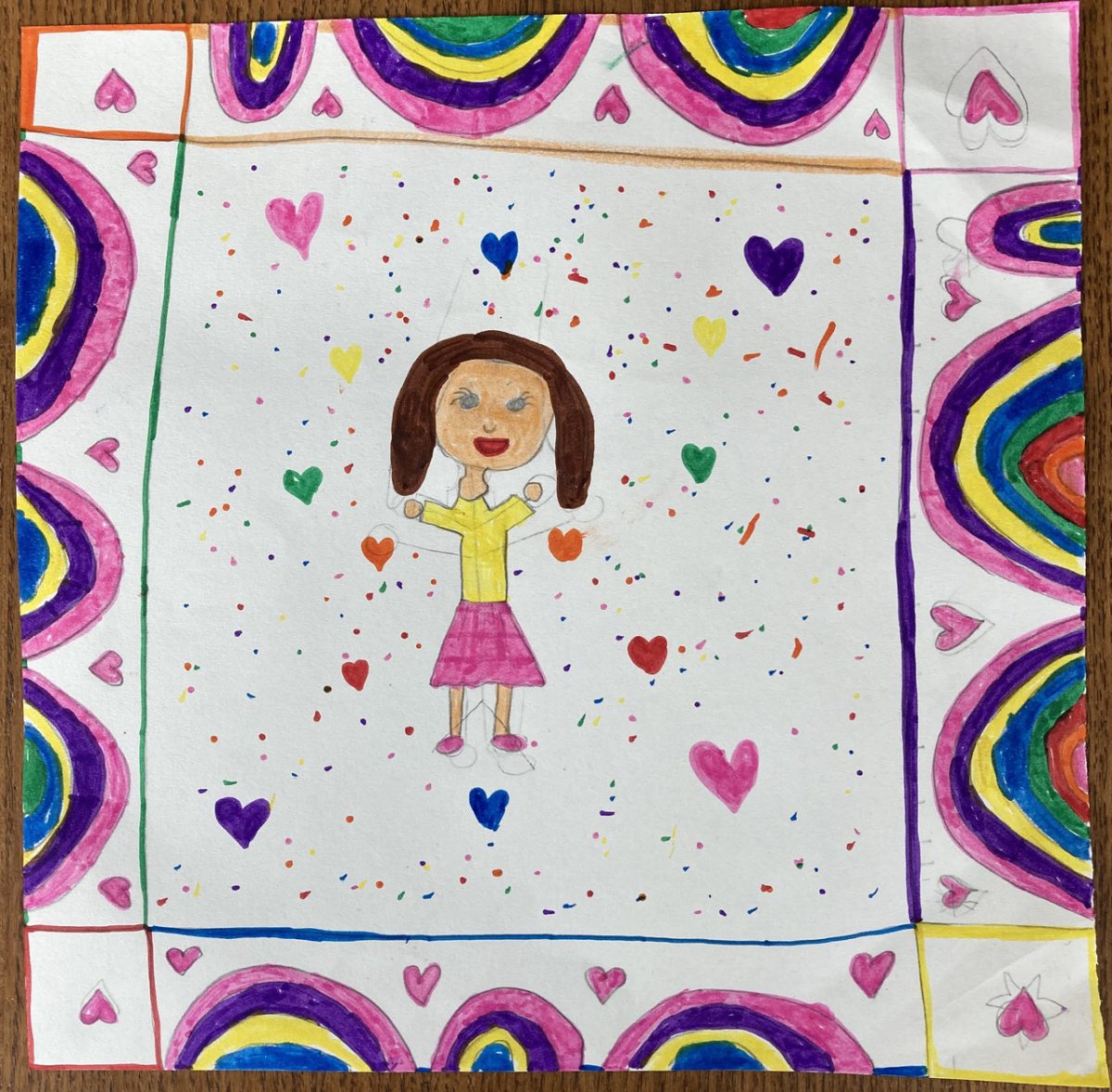 Drawing of a girl surrounded by hearts and decorations