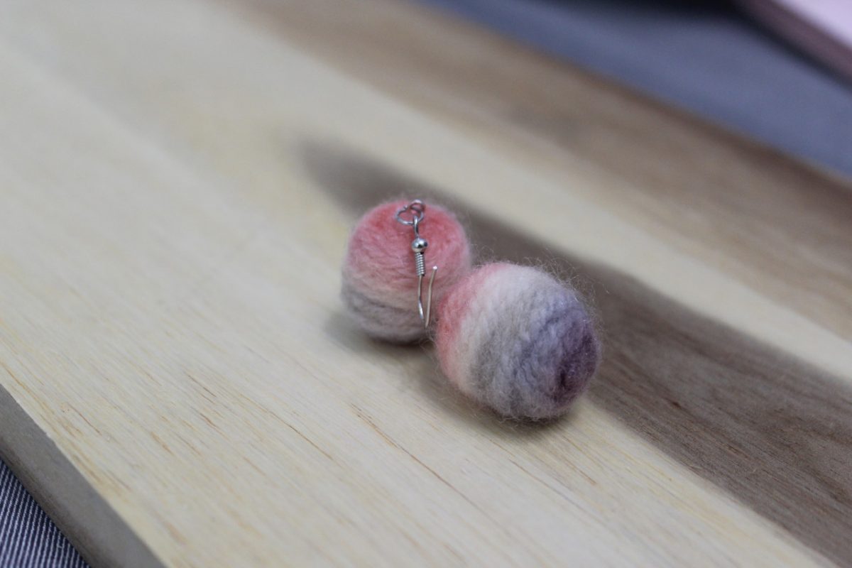 Photo of round yarn earrings