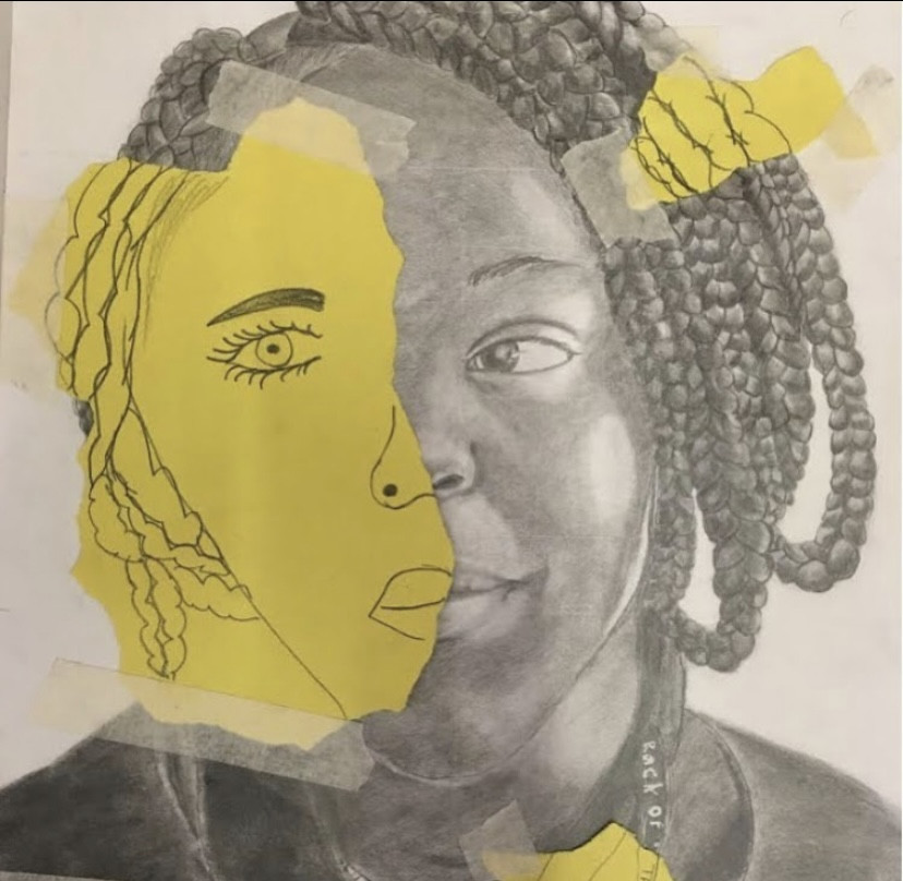 Drawing of a girl with yellow construction paper attached