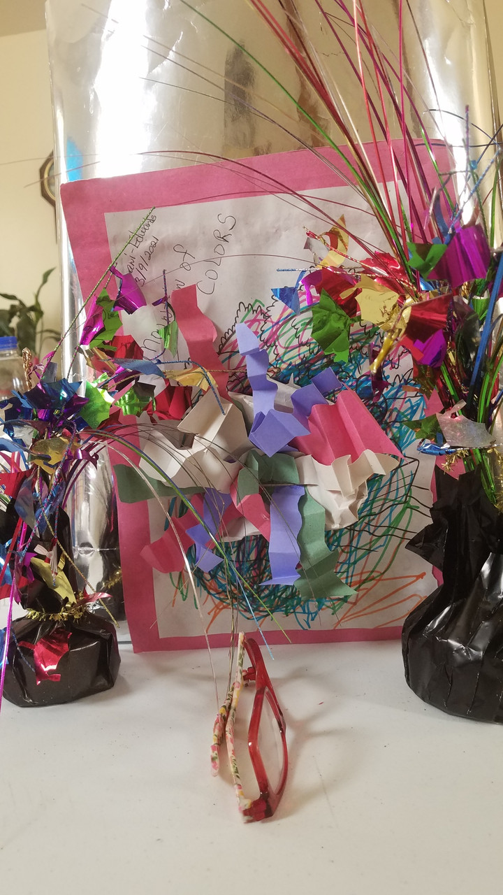 Sculpture of bright colored cut paper