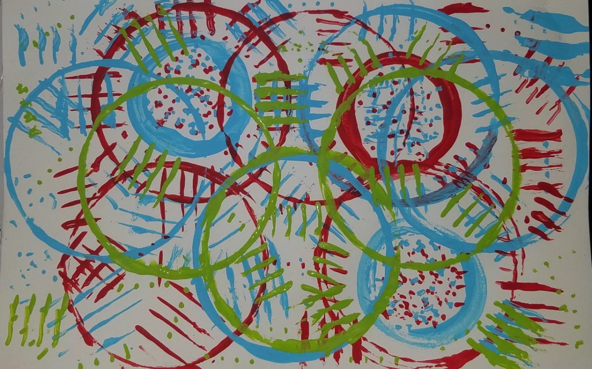 Print of repeating red, green, and blue circles.